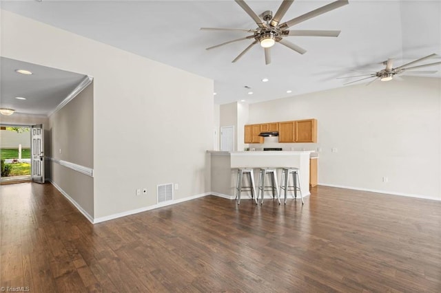 6051 Brookstone Ridge Dr, Winston-Salem, NC 27107 - unfurnished living room with wood finished floors, ceiling fan, baseboards, recessed lighting, and ornamental molding