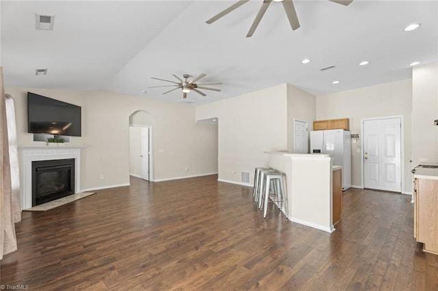 6051 Brookstone Ridge Dr, Winston-Salem, NC 27107 - unfurnished living room with ceiling fan, dark wood-style floors, a fireplace with flush hearth, recessed lighting, and baseboards