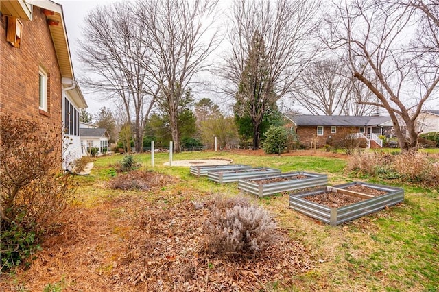 view of yard featuring a vegetable garden