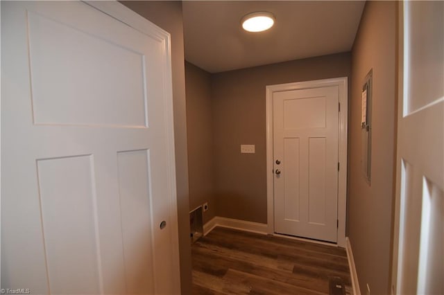 entryway featuring dark wood-style floors and baseboards