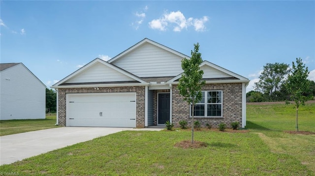 152 Rose Wind Way, Mayodan, NC 27027 - view of front of home with a garage, driveway, a front lawn, and brick siding