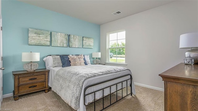 152 Rose Wind Way, Mayodan, NC 27027 - bedroom featuring light carpet, baseboards, and visible vents