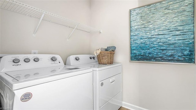 152 Rose Wind Way, Mayodan, NC 27027 - washroom with laundry area, baseboards, and washer and dryer