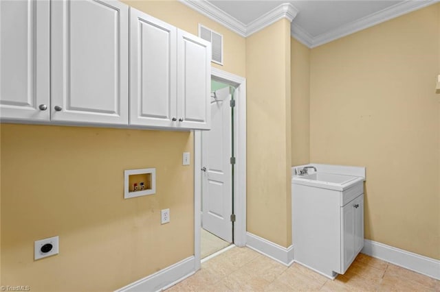 5080 Century Oaks Ln, Winston-Salem, NC 27106 - laundry room with electric dryer hookup, hookup for a washing machine, cabinet space, baseboards, and ornamental molding