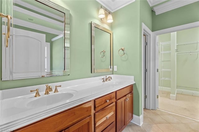 5080 Century Oaks Ln, Winston-Salem, NC 27106 - full bath with double vanity, crown molding, tile patterned floors, a walk in closet, and baseboards