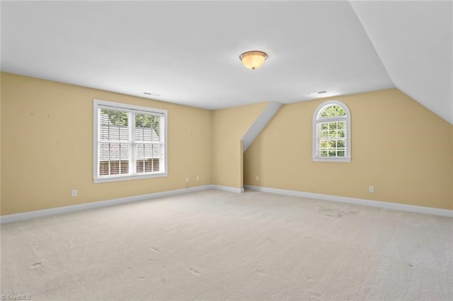 5080 Century Oaks Ln, Winston-Salem, NC 27106 - bonus room featuring plenty of natural light, light colored carpet, vaulted ceiling, and baseboards