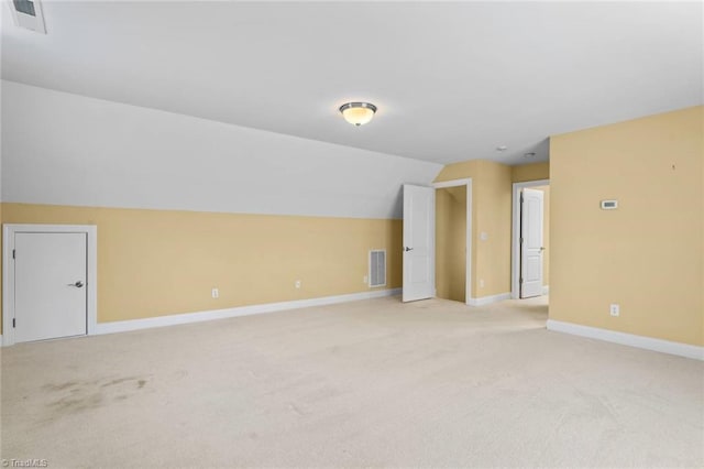 5080 Century Oaks Ln, Winston-Salem, NC 27106 - additional living space with light colored carpet, baseboards, and lofted ceiling