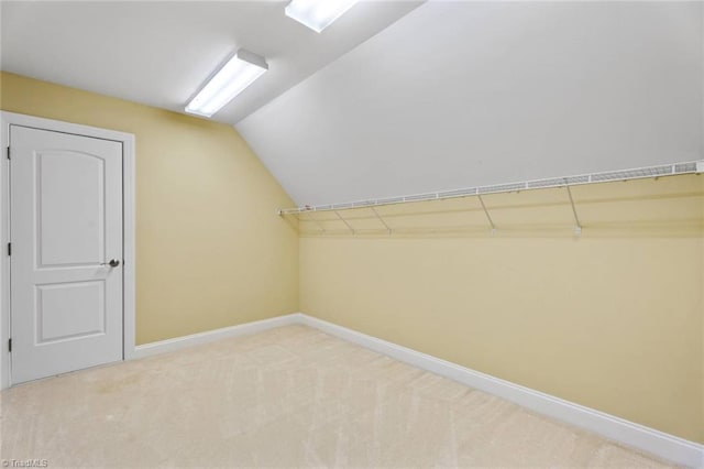 5080 Century Oaks Ln, Winston-Salem, NC 27106 - additional living space featuring lofted ceiling, baseboards, and light carpet