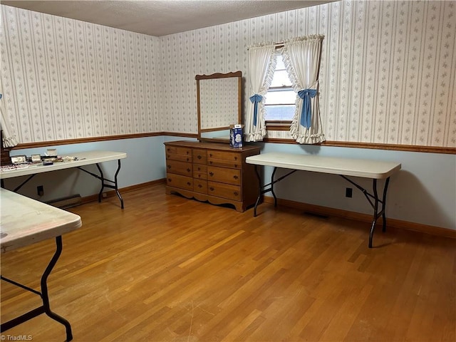 office area with hardwood / wood-style flooring