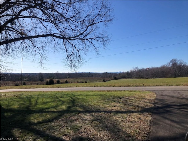 view of road with a rural view