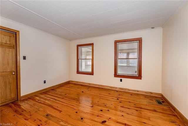 empty room featuring hardwood / wood-style floors