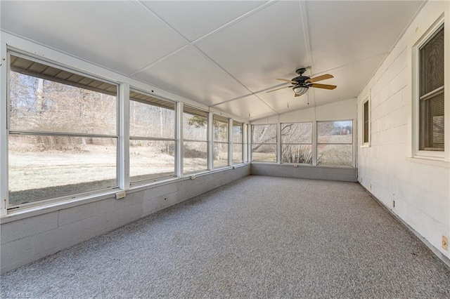 unfurnished sunroom featuring vaulted ceiling and ceiling fan