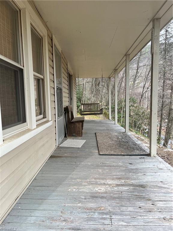 8253 N NC Highway 16, Millers Creek, NC 28651 - view of wooden porch