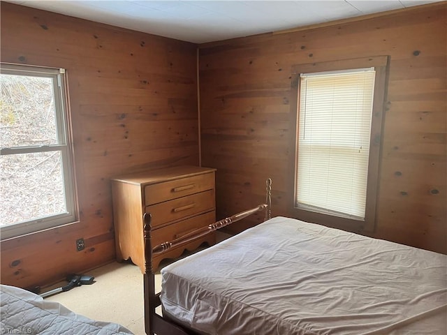 8253 N NC Highway 16, Millers Creek, NC 28651 - bedroom with wooden walls and multiple windows