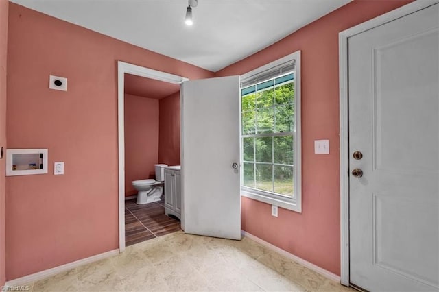 1224 Downing St, High Point, NC 27260 - doorway to outside with baseboards and tile patterned flooring