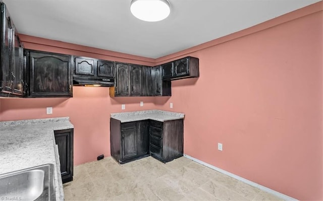 1224 Downing St, High Point, NC 27260 - bar area with under cabinet range hood and baseboards
