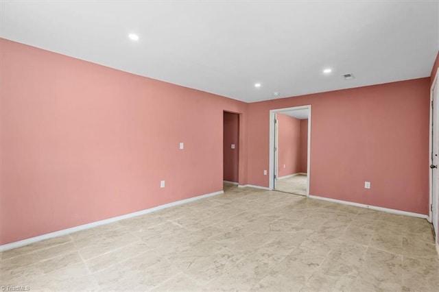 1224 Downing St, High Point, NC 27260 - unfurnished room featuring baseboards and recessed lighting