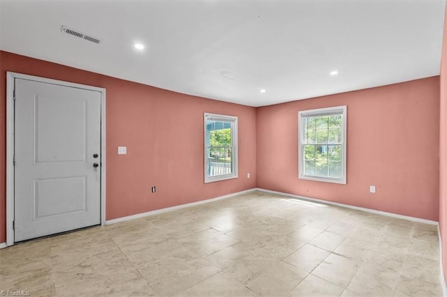 1224 Downing St, High Point, NC 27260 - unfurnished room with baseboards and recessed lighting