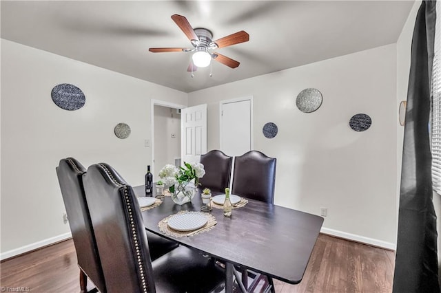 615 Sherman St, Greensboro, NC 27410 - dining room with ceiling fan, baseboards, and wood finished floors