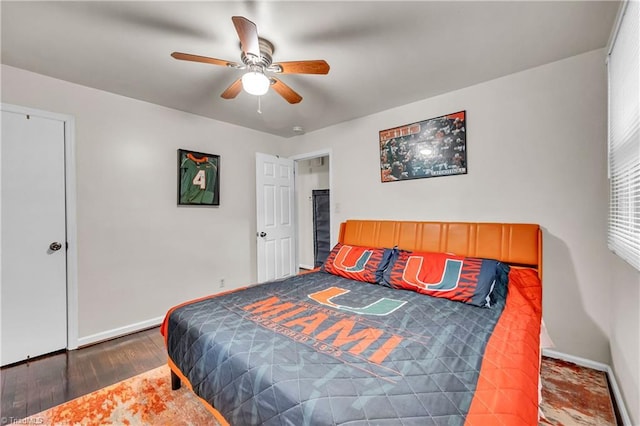 615 Sherman St, Greensboro, NC 27410 - bedroom with wood finished floors, baseboards, and a ceiling fan