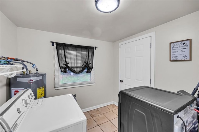 615 Sherman St, Greensboro, NC 27410 - laundry area featuring washing machine and dryer, water heater, baseboards, and light tile patterned floors