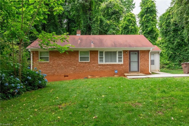 615 Sherman St, Greensboro, NC 27410 - single story home with brick siding, a front lawn, crawl space, and a shingled roof
