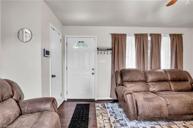 615 Sherman St, Greensboro, NC 27410 - living room featuring wood finished floors, a ceiling fan, and baseboards