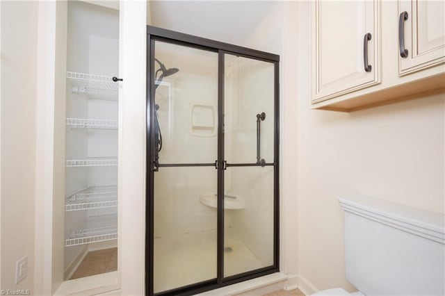 bathroom featuring walk in shower