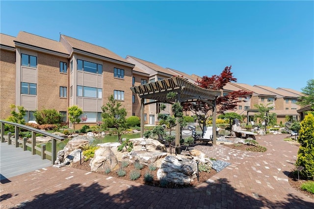 view of property's community with a pergola