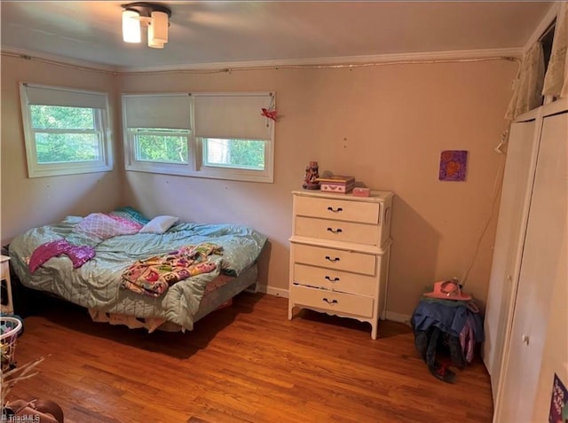 357 Town N Country Dr, Wilkesboro, NC 28697 - bedroom with wood finished floors and ornamental molding