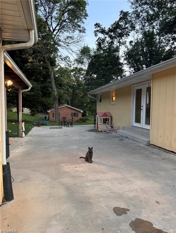 357 Town N Country Dr, Wilkesboro, NC 28697 - view of patio with french doors