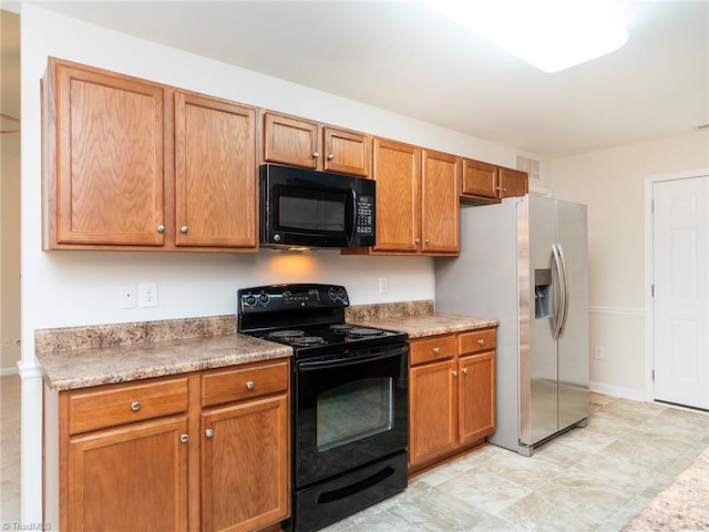 kitchen featuring black appliances