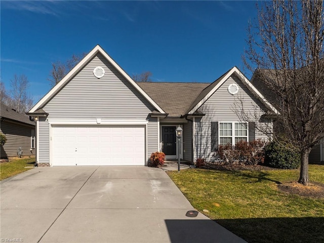 single story home with a garage and a front lawn