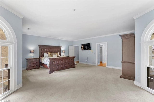 bedroom featuring light colored carpet, ornamental molding, and baseboards