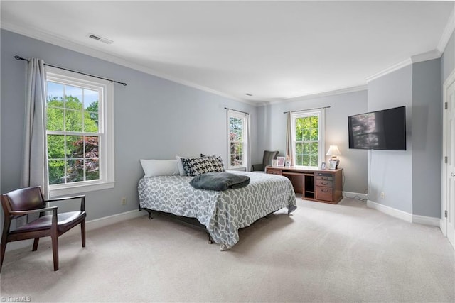 bedroom with ornamental molding, baseboards, visible vents, and multiple windows
