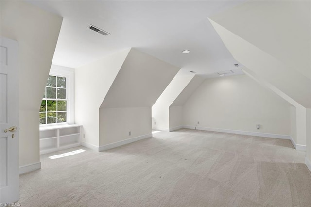 bonus room with lofted ceiling, visible vents, recessed lighting, carpet floors, and baseboards