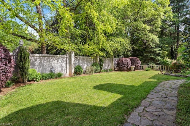 view of yard featuring fence