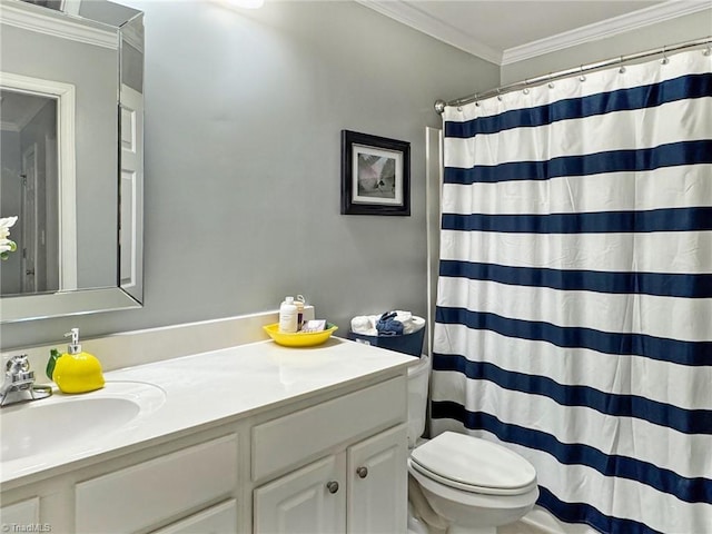full bathroom featuring ornamental molding, toilet, a shower with shower curtain, and vanity
