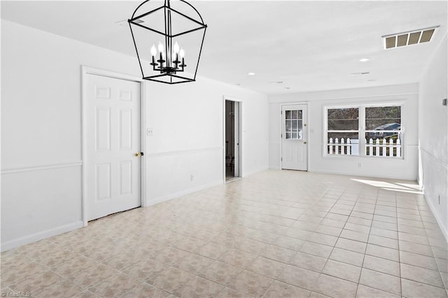 spare room featuring light tile patterned flooring