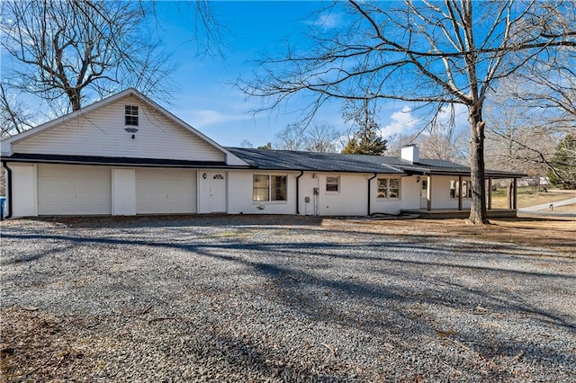 single story home with a garage