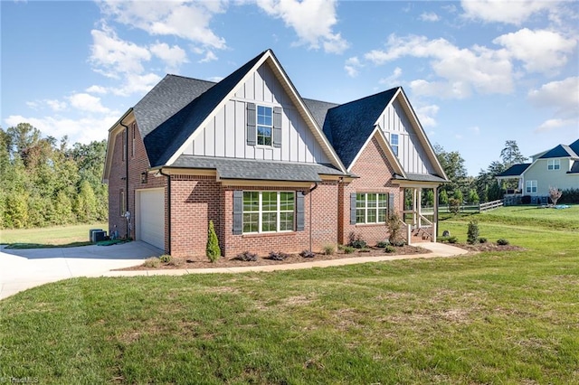 view of front of home featuring a garage, central air condition unit, and a front lawn