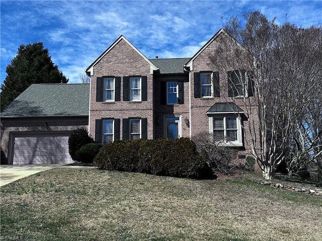 view of front of home featuring brick siding, concrete driveway, a garage, and a front yard