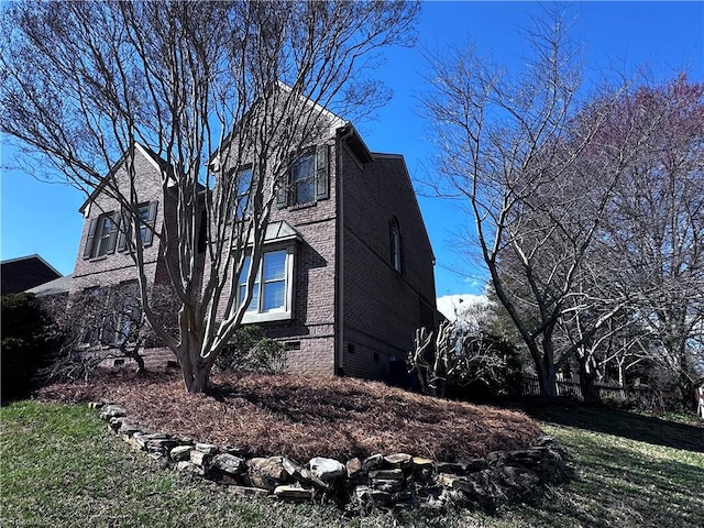 view of side of home featuring crawl space