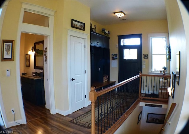 1564 Thore Rd, Pinnacle, NC 27043 - entrance foyer featuring dark wood-style flooring, baseboards, and arched walkways