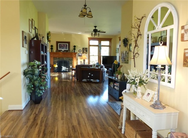 1564 Thore Rd, Pinnacle, NC 27043 - living area with wood finished floors, a ceiling fan, and a fireplace