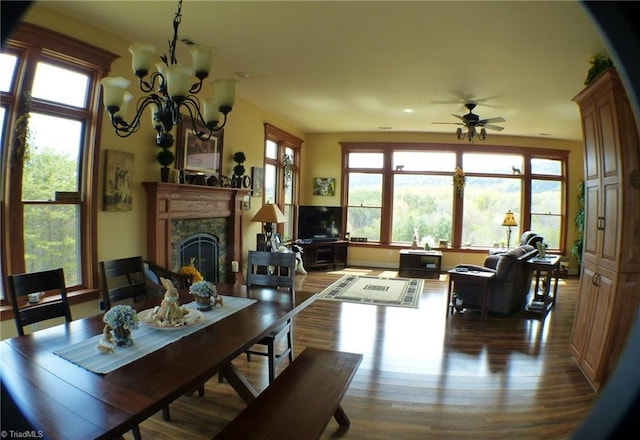 1564 Thore Rd, Pinnacle, NC 27043 - living area featuring a fireplace, dark wood-style floors, ceiling fan, and a chandelier