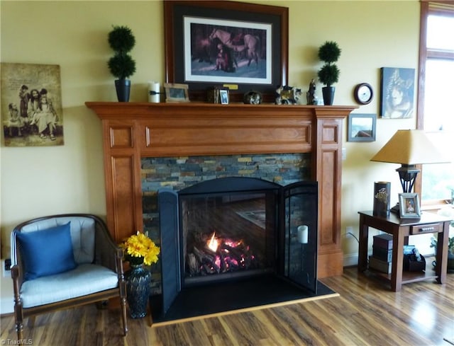 1564 Thore Rd, Pinnacle, NC 27043 - detailed view of a warm lit fireplace and wood finished floors