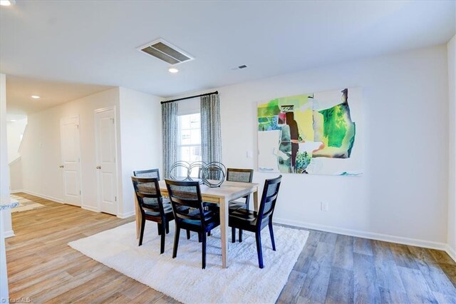 dining area featuring light hardwood / wood-style floors