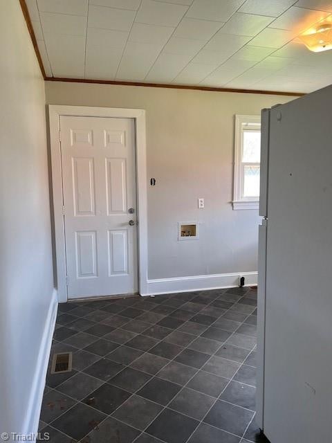 interior space with crown molding