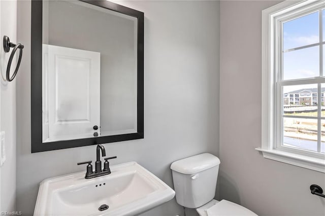 bathroom with sink and toilet